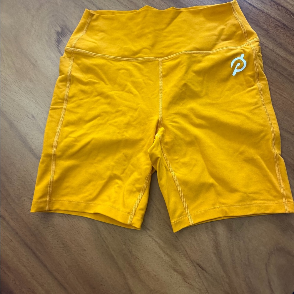 Peloton High-Waist Bike Shorts in Mustard Yellow